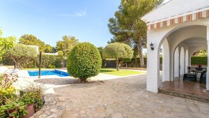 Garden with terrace and pool